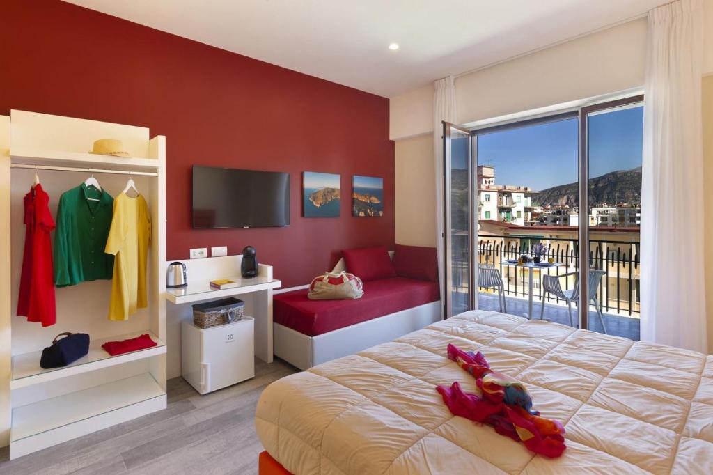 Posteľ alebo postele v izbe v ubytovaní Parco Tasso Guest House