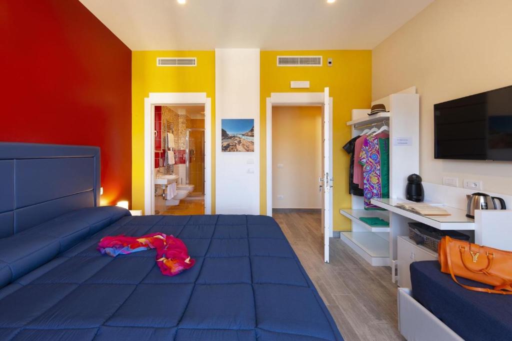 Televízia a/alebo spoločenská miestnosť v ubytovaní Parco Tasso Guest House