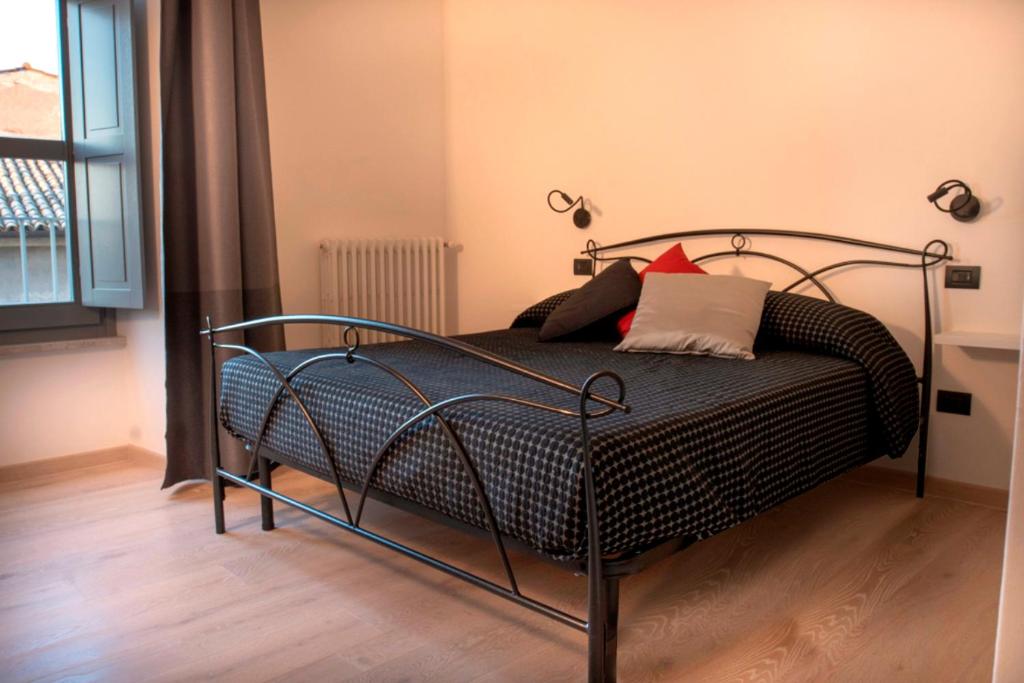 Lova arba lovos apgyvendinimo įstaigoje La Dimora delle Zitelle Sperse - Parcheggio privato