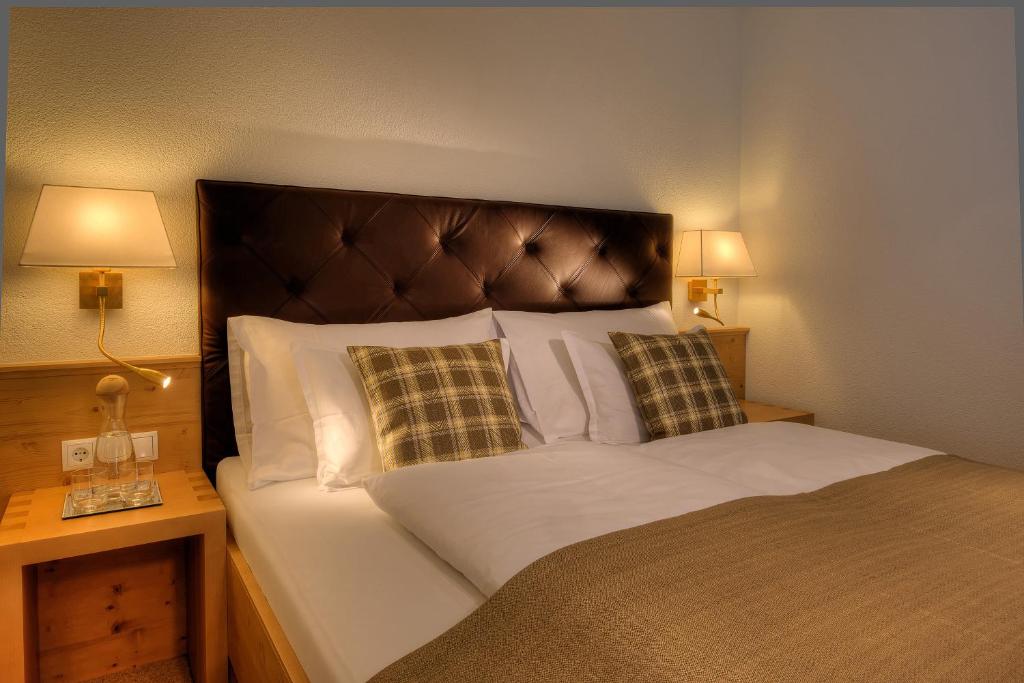 Postel nebo postele na pokoji v ubytování Hotel Palin