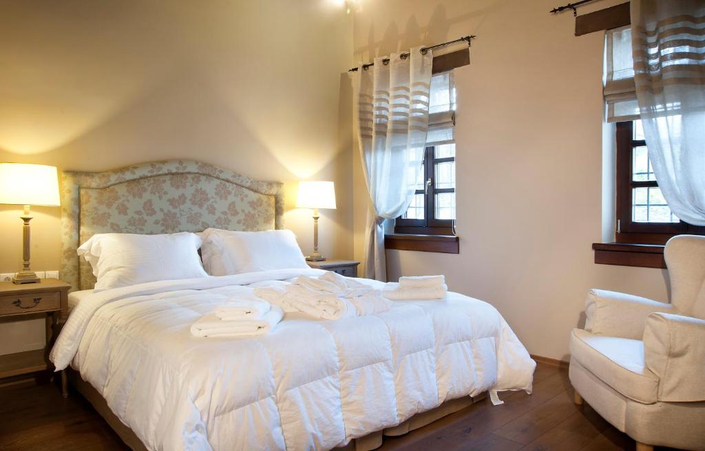 Postel nebo postele na pokoji v ubytování Aberratio Boutique Hotel