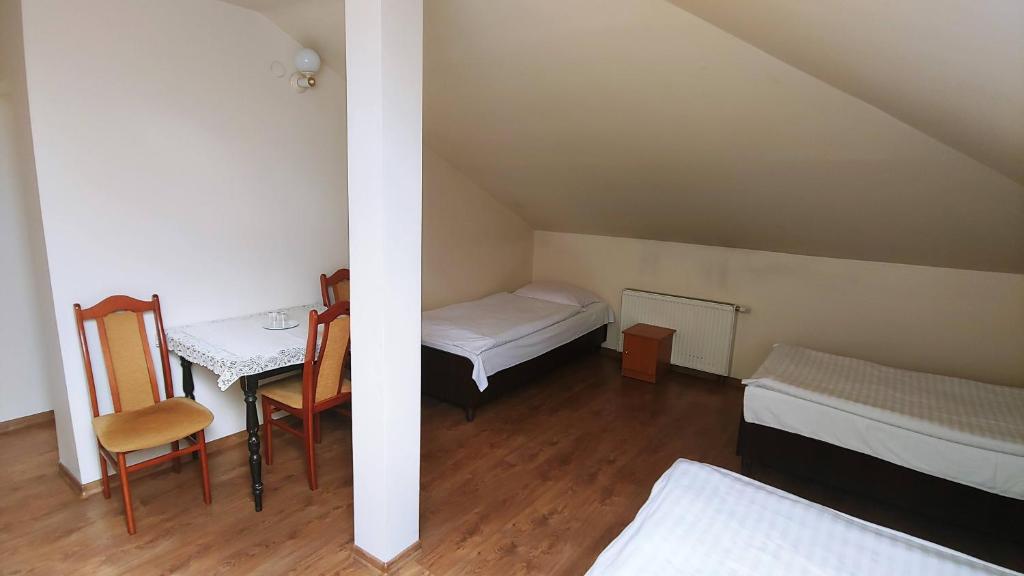 Postel nebo postele na pokoji v ubytování Hotel E7