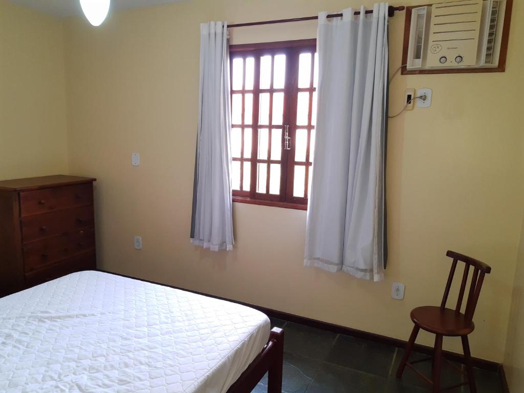 Casa de 2 andares em condomínio na Praia Grande.