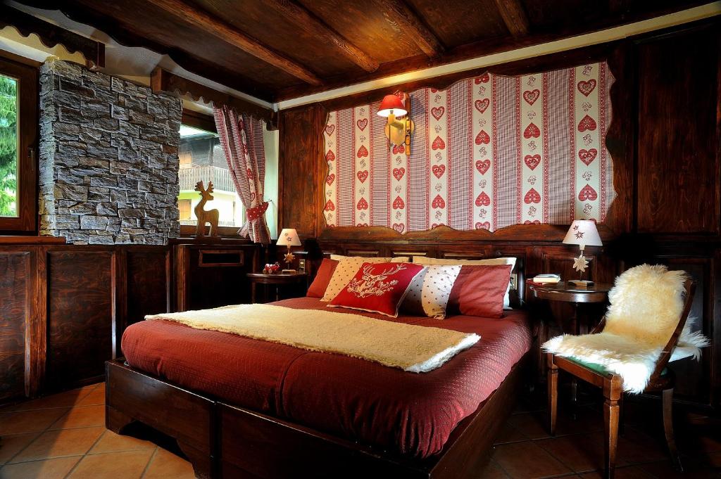 Postel nebo postele na pokoji v ubytování Residence Foyer D'Antan