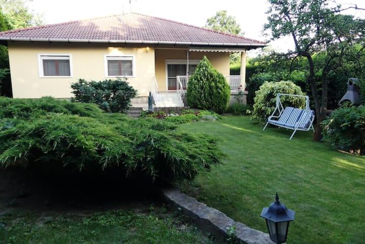A garden outside Villa Csilla elegant house