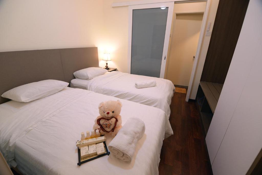 Postel nebo postele na pokoji v ubytování Cosy private suite 2BR 591 Nexus USJ Shah Alam