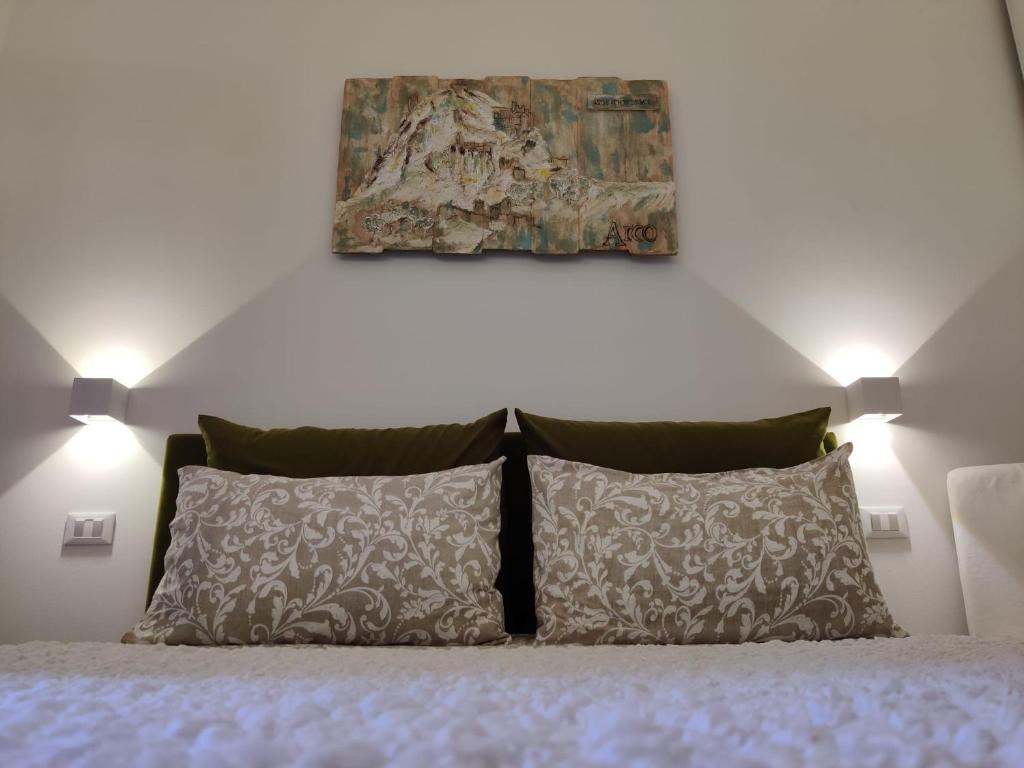 Postel nebo postele na pokoji v ubytování River Inn Arco