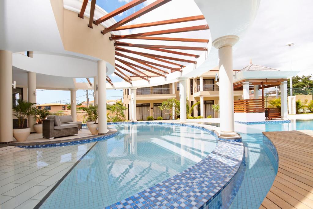 Bazén v ubytování Villasun Luxury Apartments & Villas nebo v jeho okolí