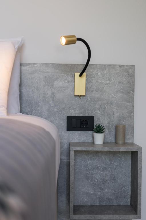 Posteľ alebo postele v izbe v ubytovaní Nectar Luxury Residence