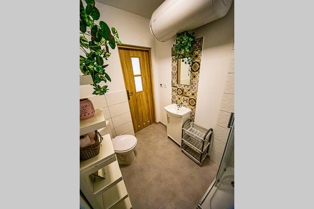 Kúpeľňa v ubytovaní apartament Rynek