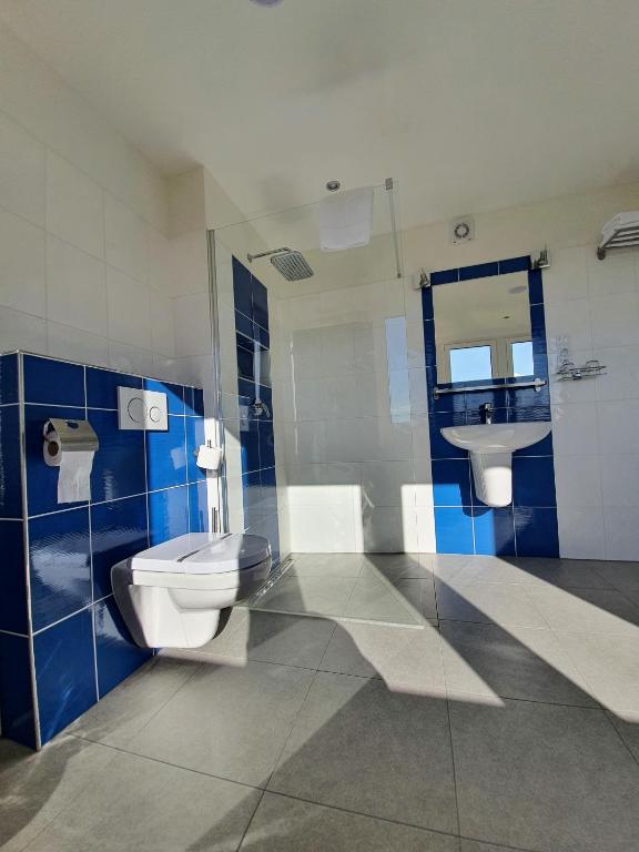 Koupelna v ubytování Hotel CHODOV ASC