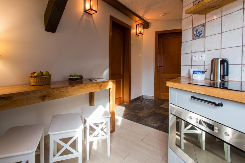 Kuchyň nebo kuchyňský kout v ubytování Oliwa Park Residence