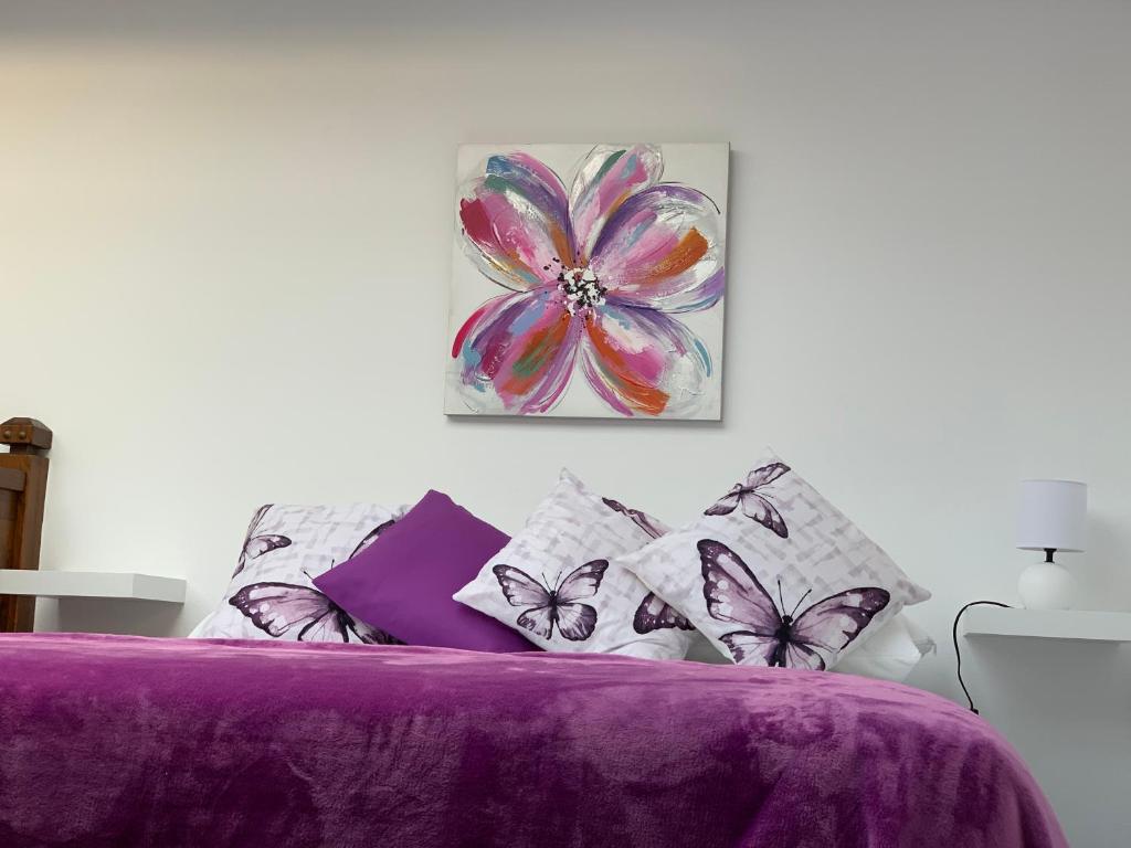 A bed or beds in a room at Pico Partido villa heated pool
