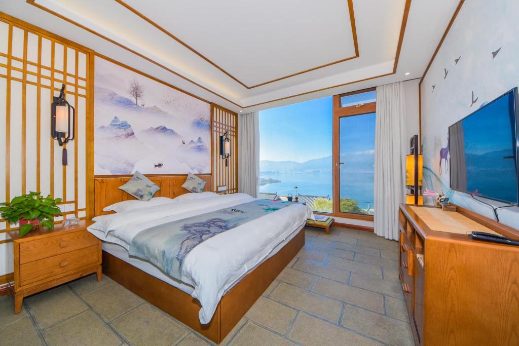 TV a/nebo společenská místnost v ubytování Dali Dare Sea View Gueshouse