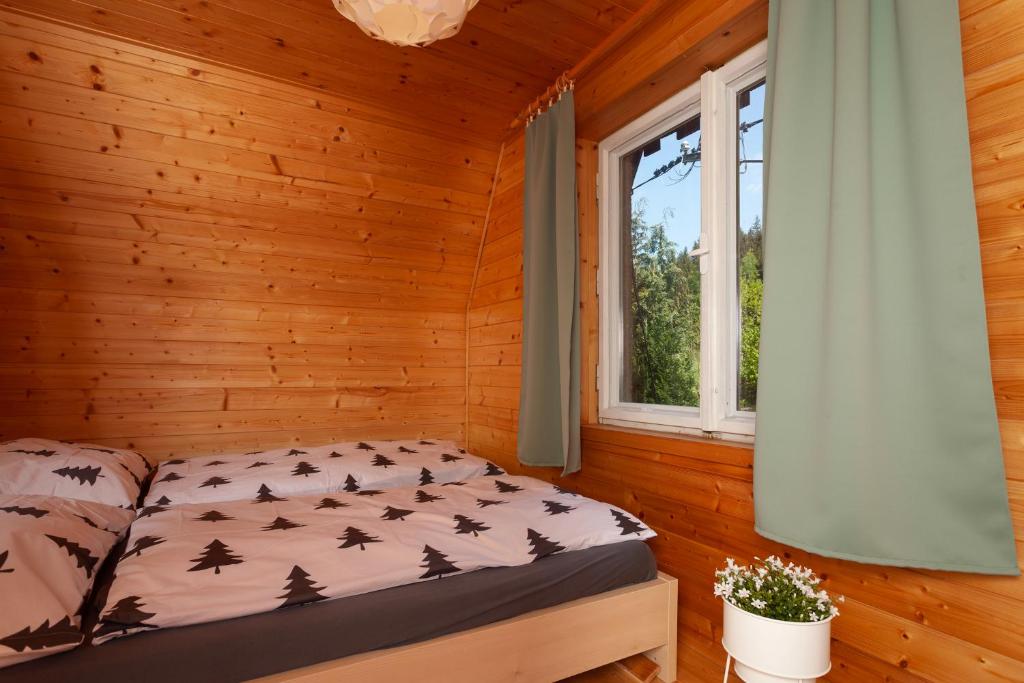 Postel nebo postele na pokoji v ubytování Tři smrčky