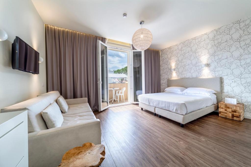 Postel nebo postele na pokoji v ubytování Hotel Select Suites & Spa - Apartments