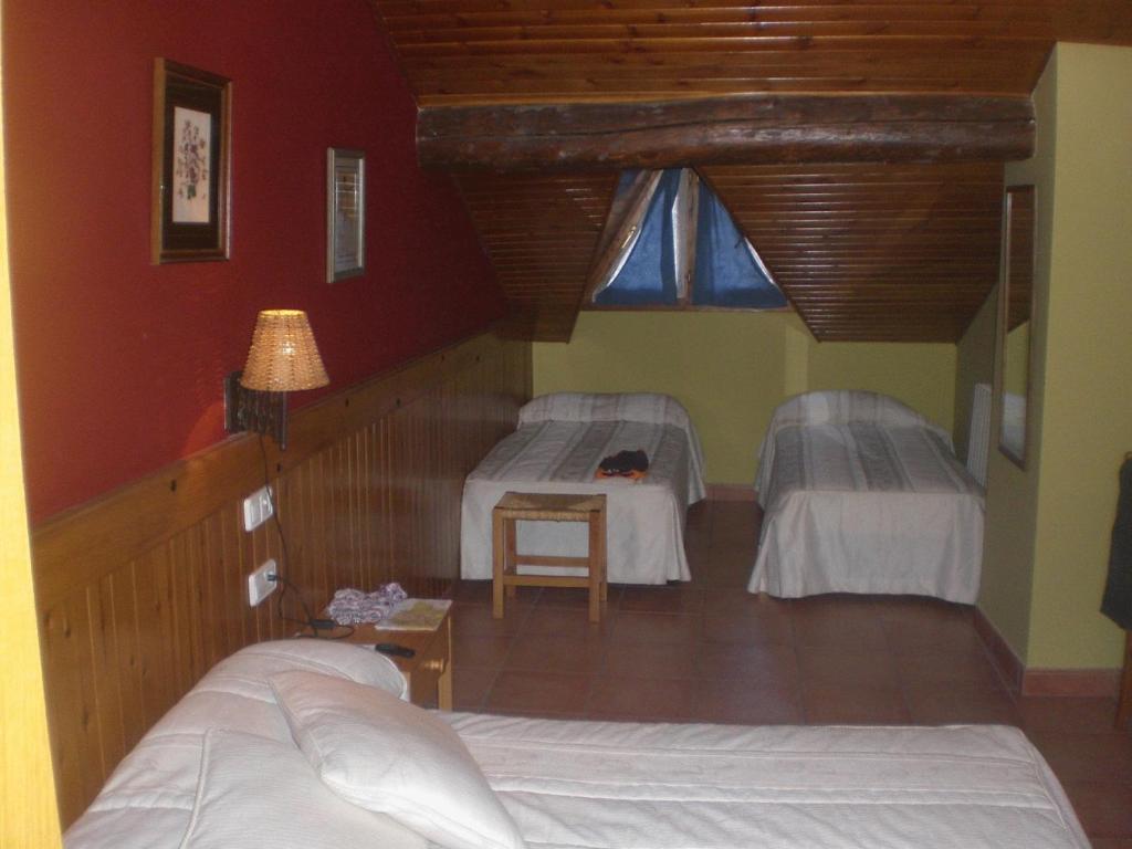Postel nebo postele na pokoji v ubytování Roch Hotel