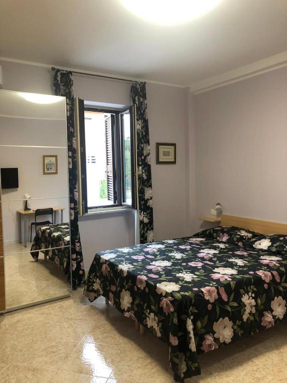 Postel nebo postele na pokoji v ubytování B&B Antonella