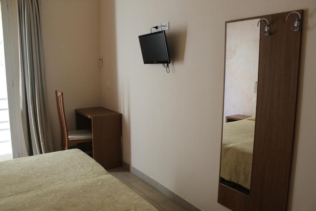 Postel nebo postele na pokoji v ubytování Hotel Adria Nuova