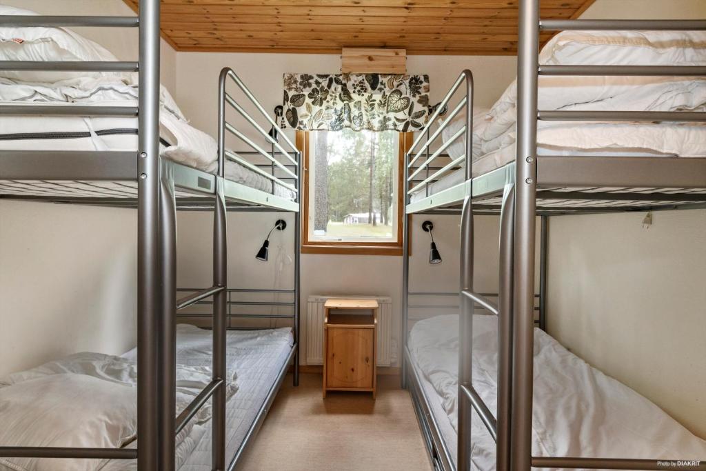 Postel nebo postele na pokoji v ubytování First Camp Mellsta-Borlänge