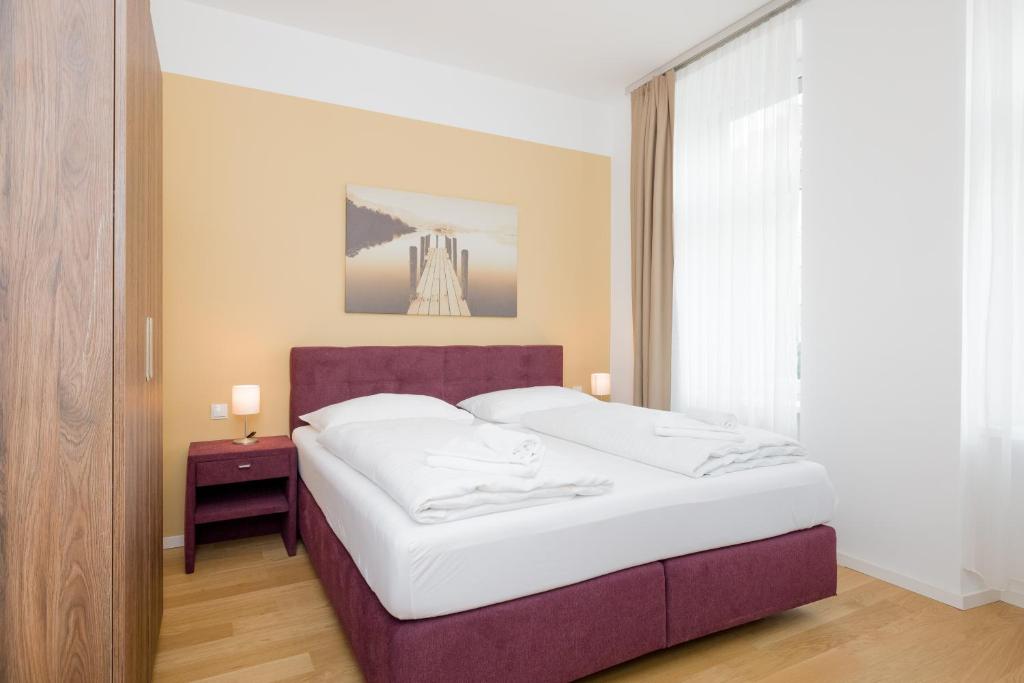 Postel nebo postele na pokoji v ubytování Vienna Stay Apartments or Rooms 1050