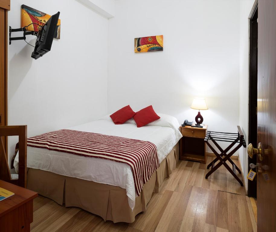 Postel nebo postele na pokoji v ubytování Hotel Samaña