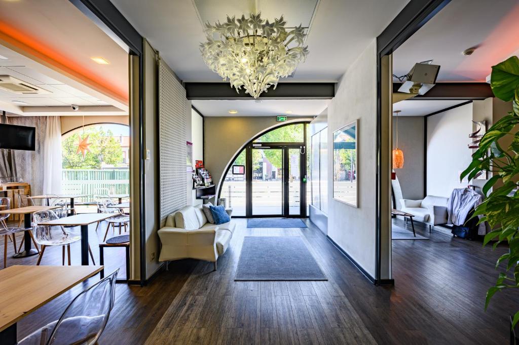 Posezení v ubytování Hotel Gascogne