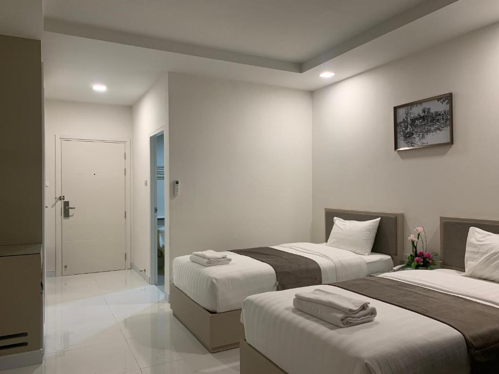 Icare Residence & Hotel - Tweepersoonskamer Met 2 Aparte Bedden