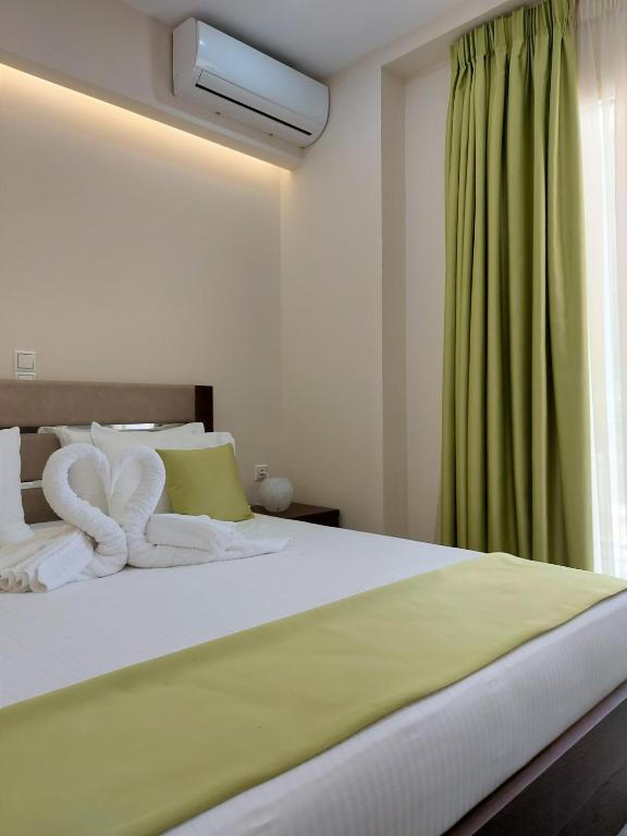 Postel nebo postele na pokoji v ubytování Tresor Apartments