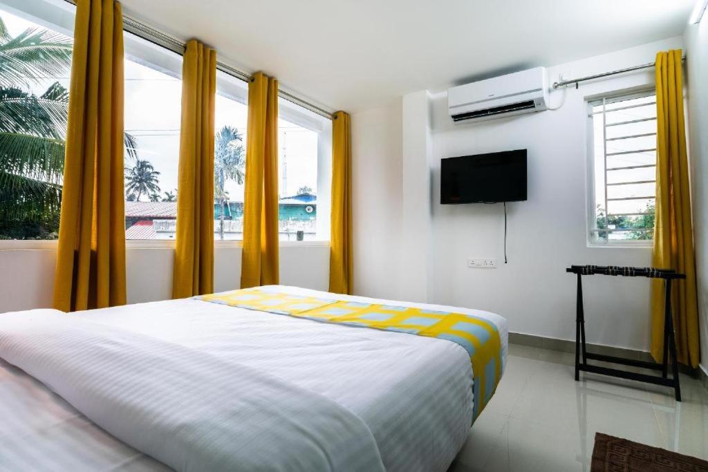TV a/nebo společenská místnost v ubytování Flamingo Suites