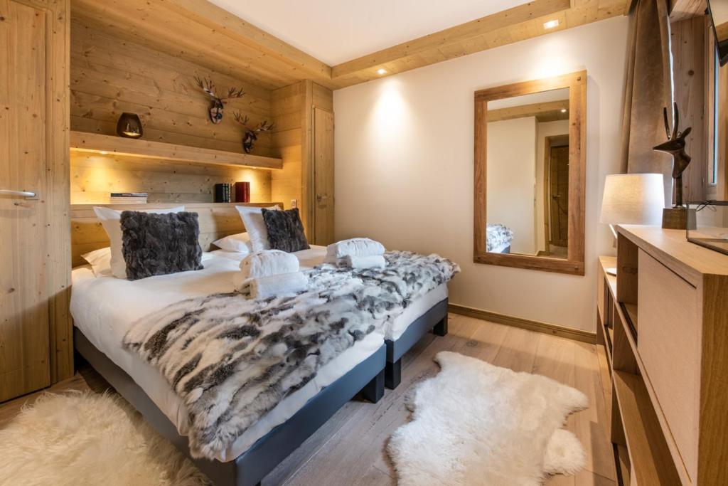 Postel nebo postele na pokoji v ubytování Mammoth Lodge by Alpine Resorts
