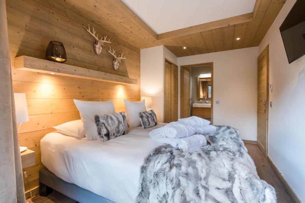 Postel nebo postele na pokoji v ubytování Mammoth Lodge by Alpine Resorts