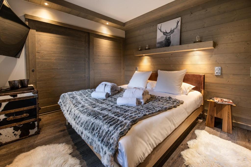 Postel nebo postele na pokoji v ubytování Mammoth Lodge by Alpine Resorts