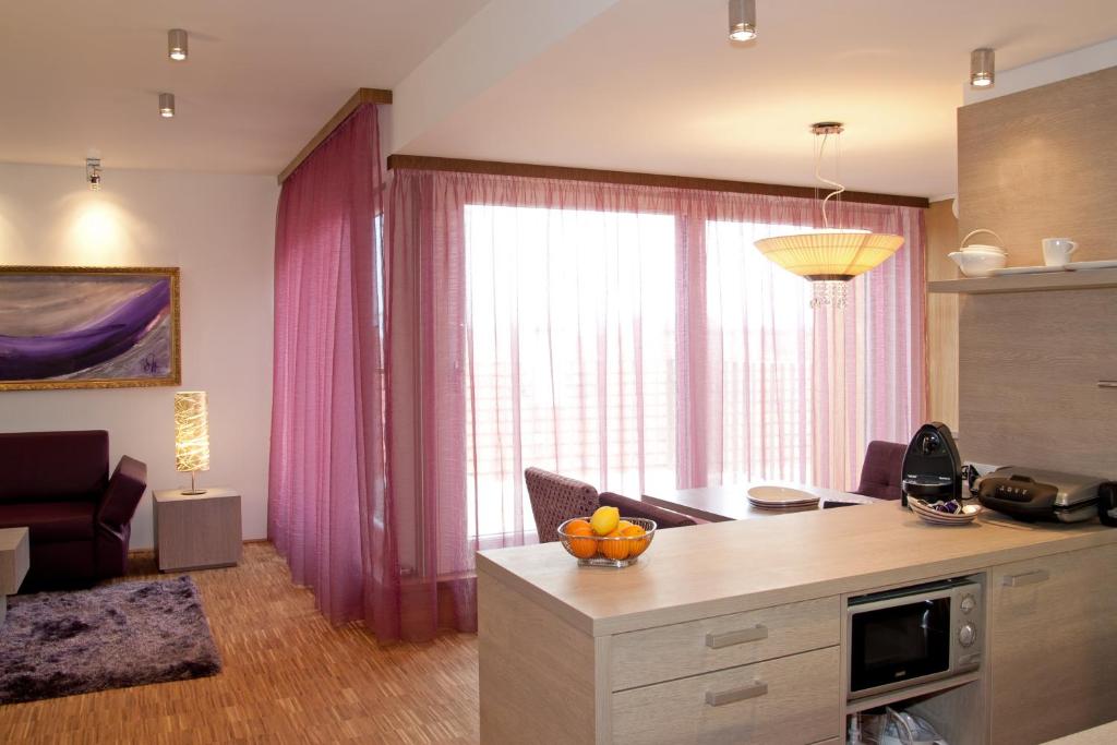 Kuchyň nebo kuchyňský kout v ubytování Deluxe Apartment Sonnleitner - ADULTS ONLY