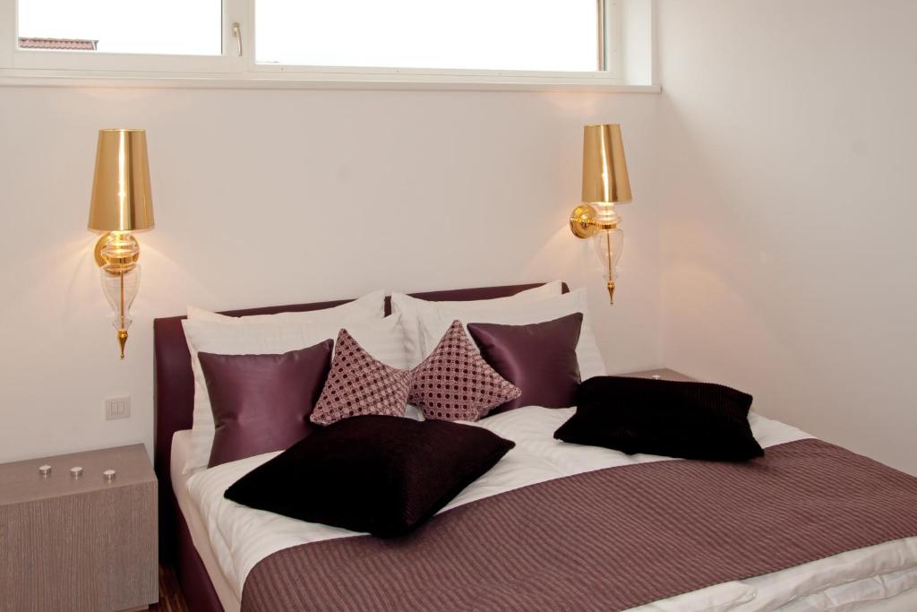 Postel nebo postele na pokoji v ubytování Deluxe Apartment Sonnleitner - ADULTS ONLY