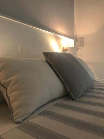 Postel nebo postele na pokoji v ubytování Hotel Plaza Esplanade