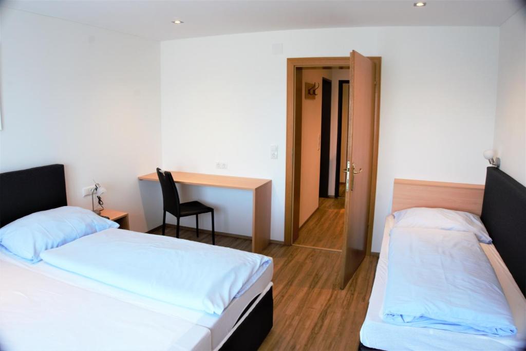 Postel nebo postele na pokoji v ubytování Hotel Wahlmüller
