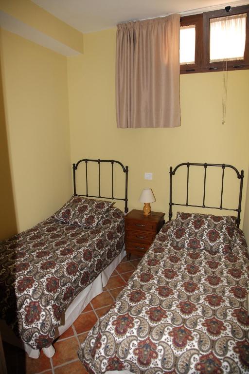 A bed or beds in a room at VACACIONAL LA TEA THE BEST LOCATION and THE BEST VIEWS