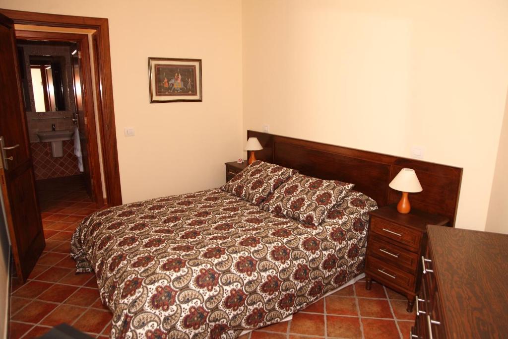 A bed or beds in a room at VACACIONAL LA TEA THE BEST LOCATION and THE BEST VIEWS