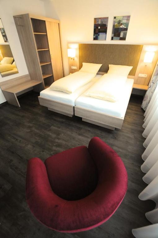Postel nebo postele na pokoji v ubytování Hotel Ritter