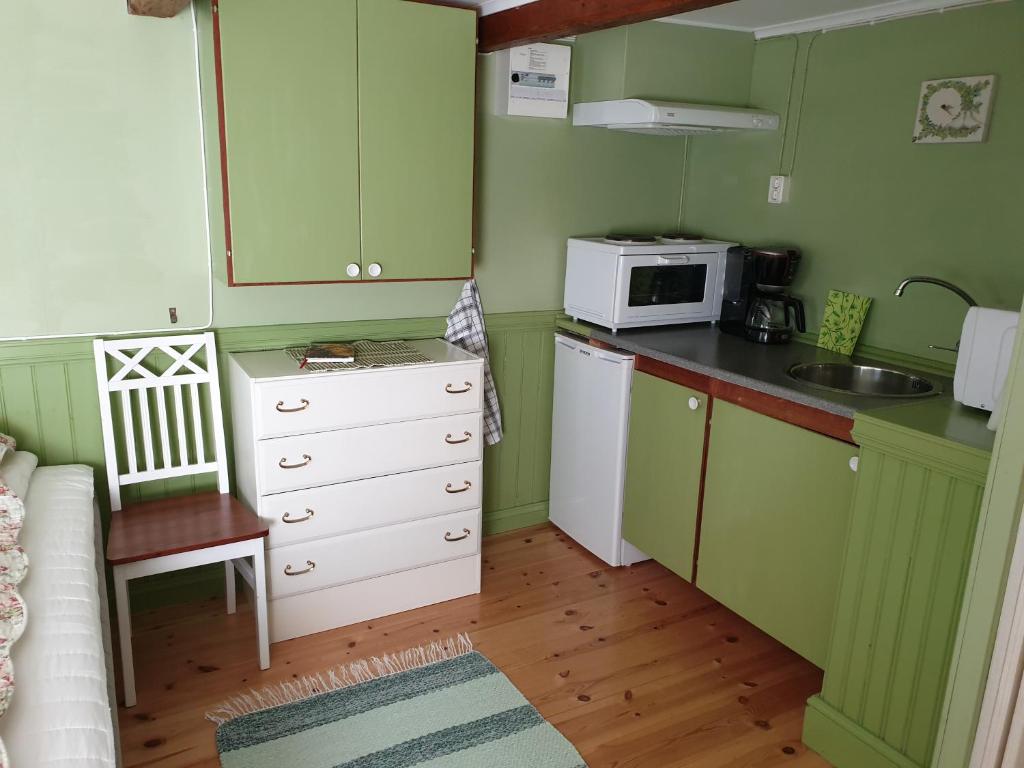 Kuchyň nebo kuchyňský kout v ubytování Bergsgatan 64