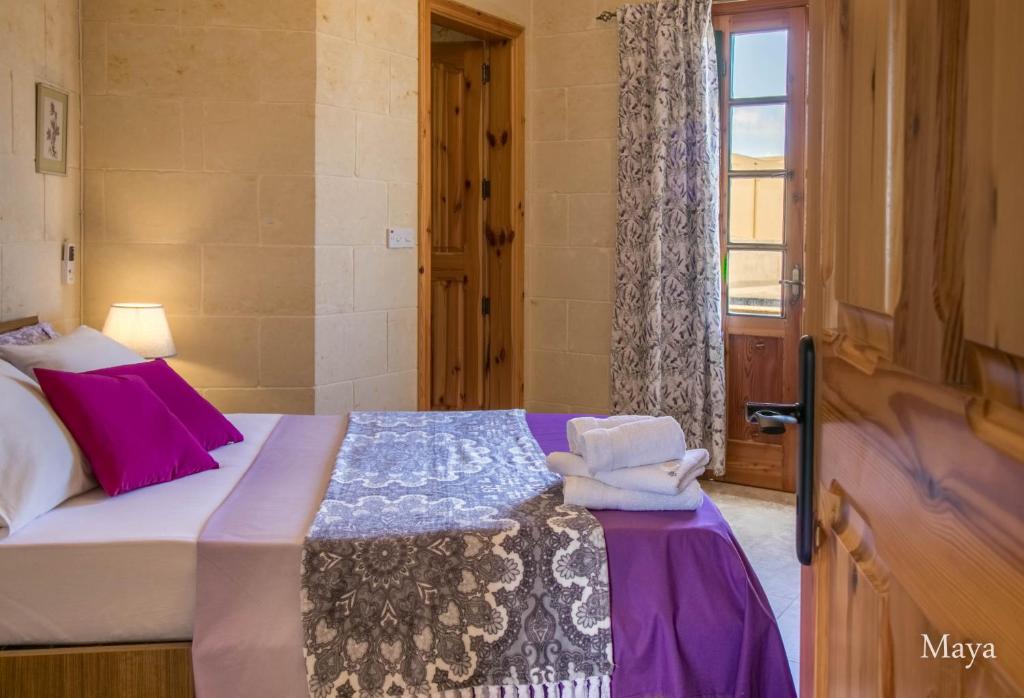 Postel nebo postele na pokoji v ubytování VinDor Villa