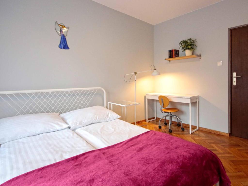 Posteľ alebo postele v izbe v ubytovaní Apartament Łukaszówki