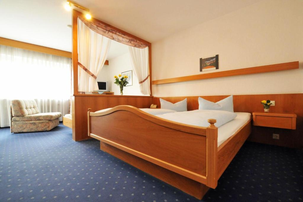 Postel nebo postele na pokoji v ubytování Hotel Ritter