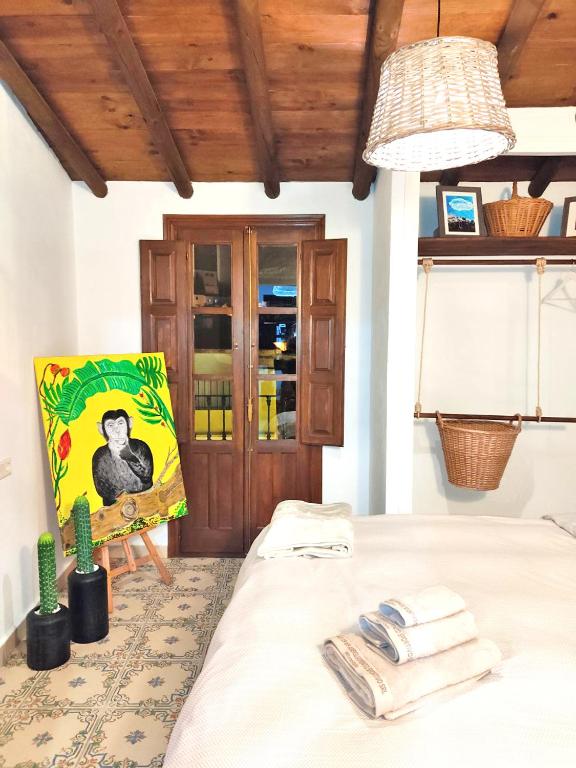 Posteľ alebo postele v izbe v ubytovaní Apartamento La Galería de Ronda