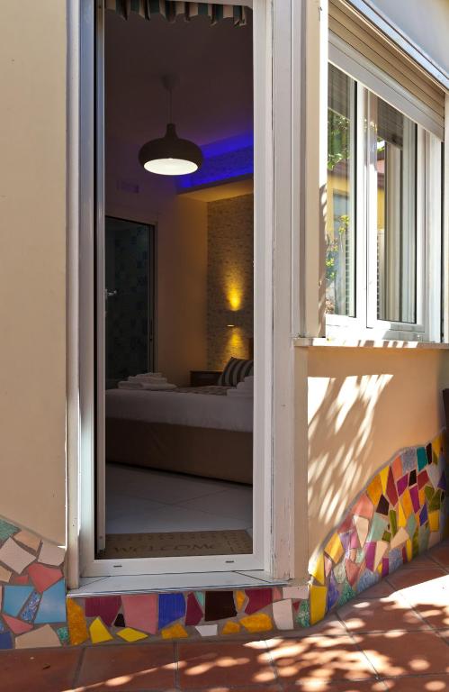 Postel nebo postele na pokoji v ubytování YourHome - Maison Nonna Anna