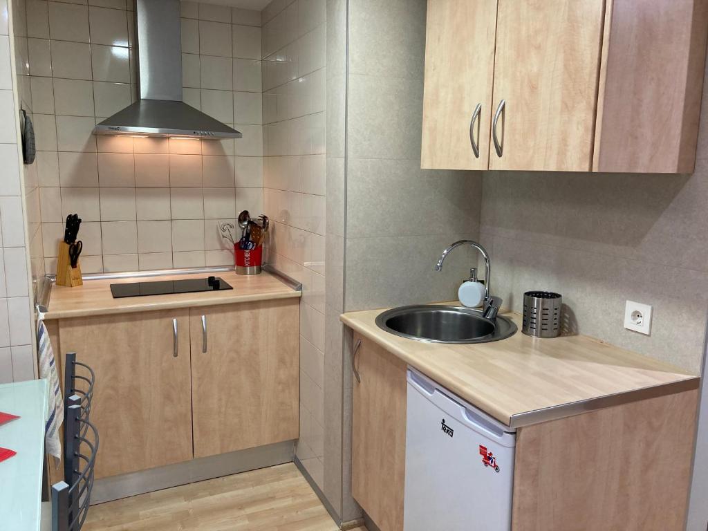Kuchyň nebo kuchyňský kout v ubytování New Studio Sito 2 Parking Gratis
