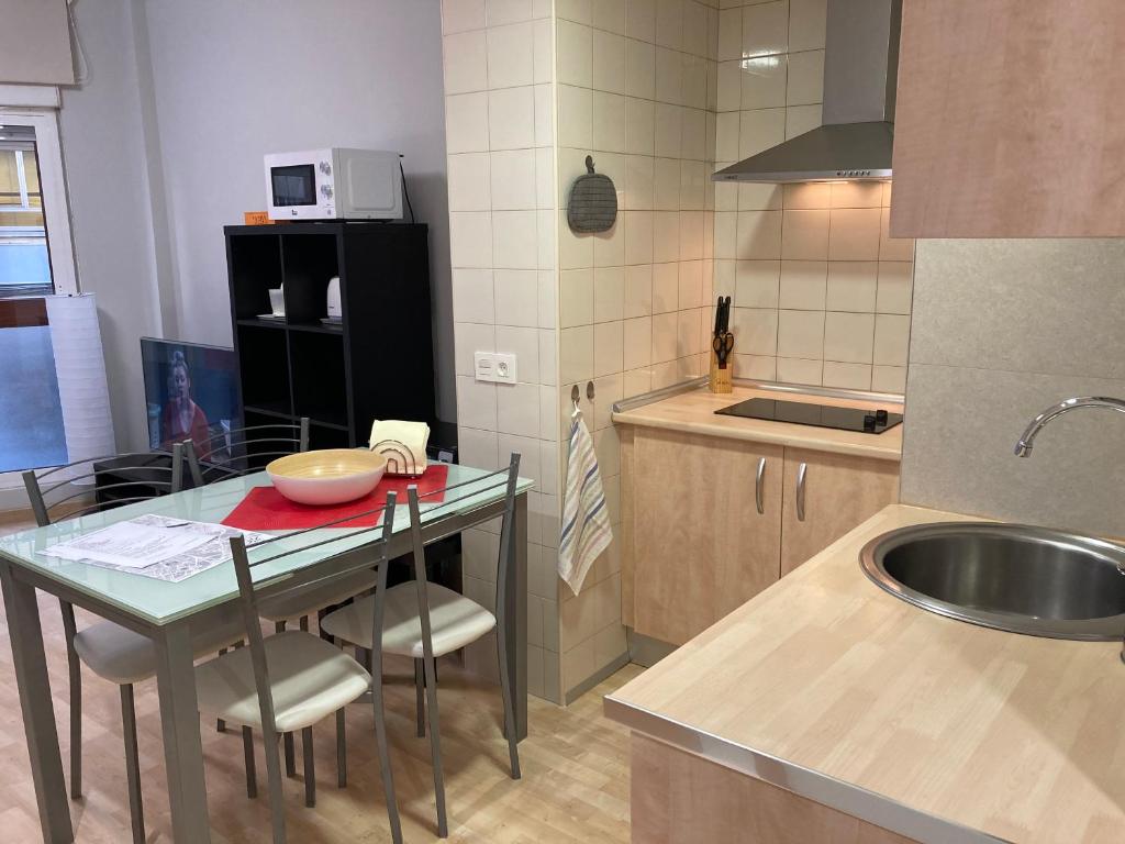 Kuchyň nebo kuchyňský kout v ubytování New Studio Sito 2 Parking Gratis