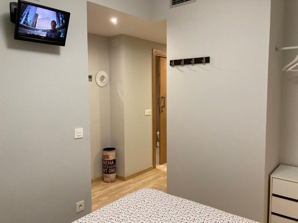 Postel nebo postele na pokoji v ubytování New Studio Sito 2 Parking Gratis