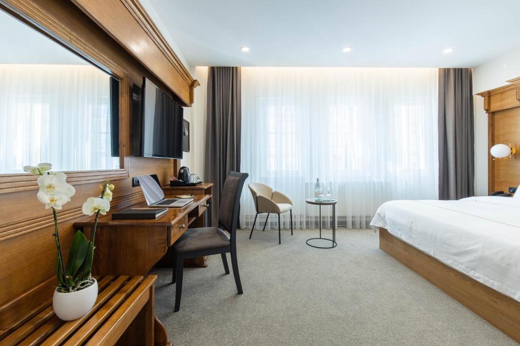 Postel nebo postele na pokoji v ubytování Hotel Afa